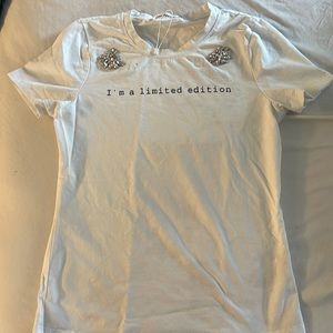 White top reads “limited edition”